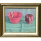 Bol et pomme rouges sur nappe verte
